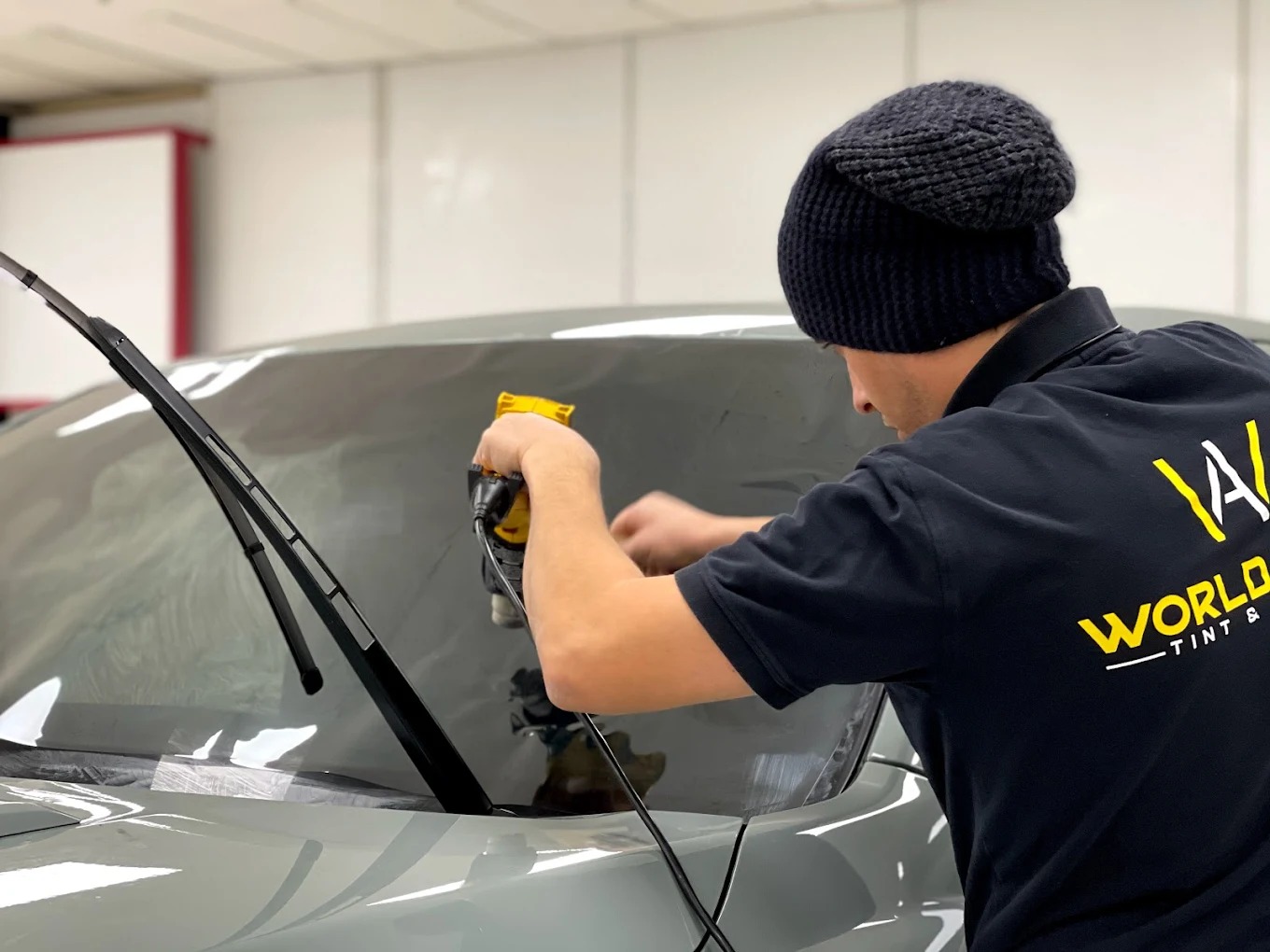 Professional 3M ceramic window tinting on a car in Sacramento by World Auto Tint and Detail